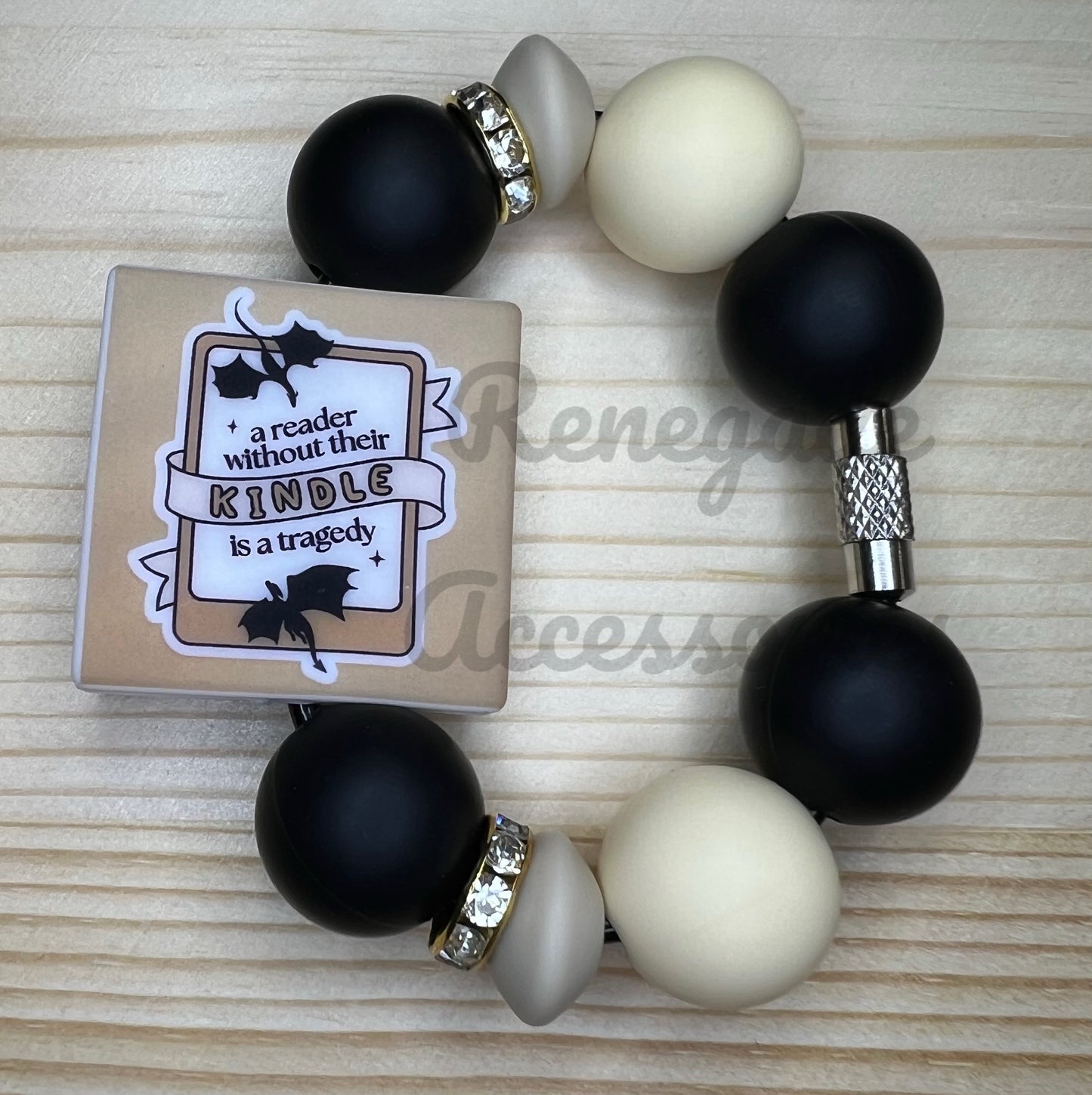 Silicone Charm - A Reader Without Their Kindle