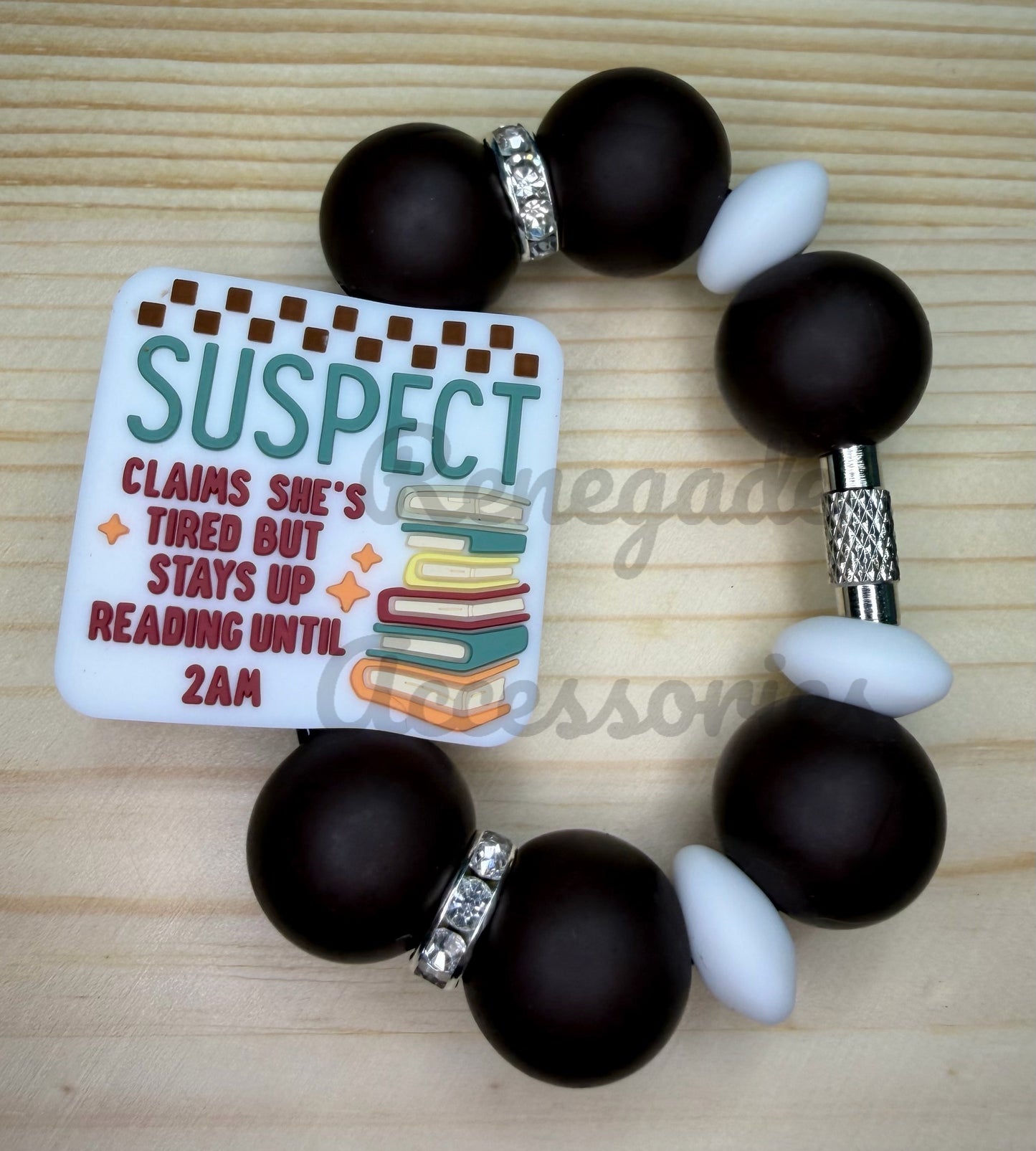 Silicone Charm - Suspect - Books